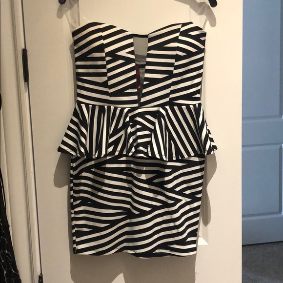 Rachel Kate Dresses & Skirts - Strap less peplum black and white mini dress